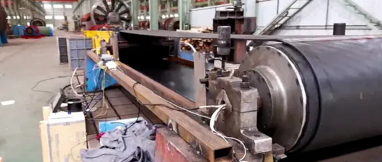 Dual-Drive Permanent-Magnet Belt Conveyor with Load Sharing for a Coal Mine