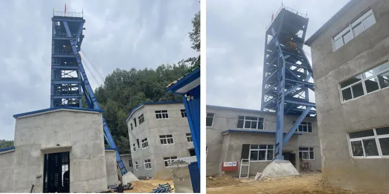 Exterior view of the mine headframe over the 600 m shaft, with the hoist house alongside