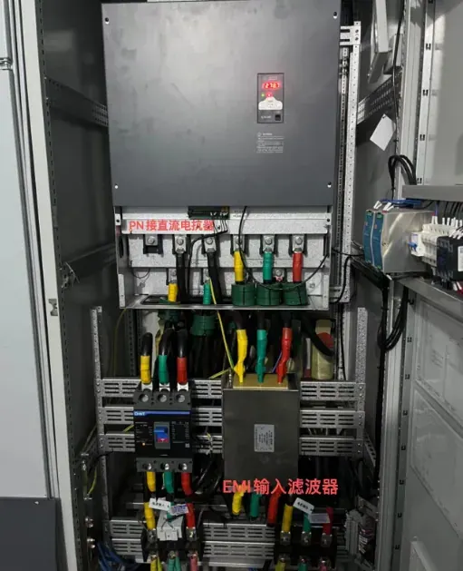 Drive cabinet interior: the converter with its EMC input filter and shielded terminations